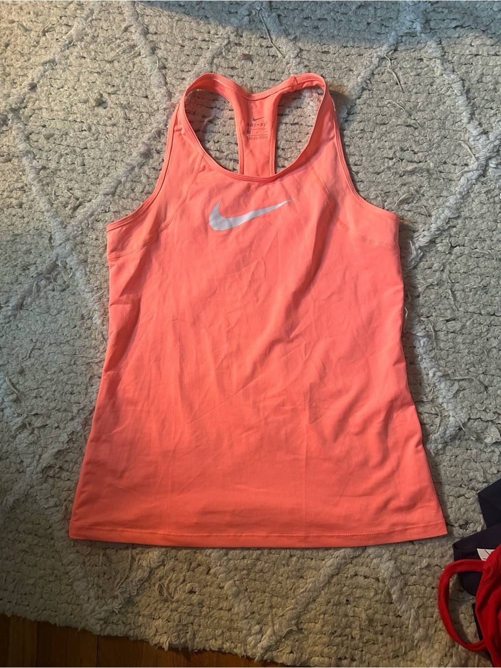 Nike Women's Coral-Peach Racerback Tank Top with Swoosh